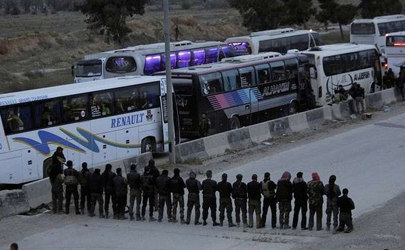 ورود 50 اتوبوس به شهرکهای جنوب دمشق برای انتقال 5 هزار تروریست به شمال سوریه